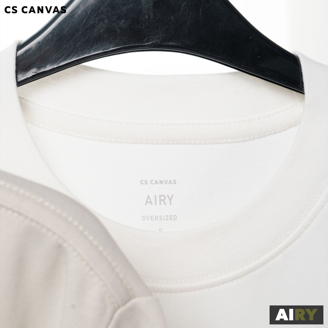 AIRY เสื้อยืดทรงโอเวอร์ไซซ์ มีกระเป๋าซิป